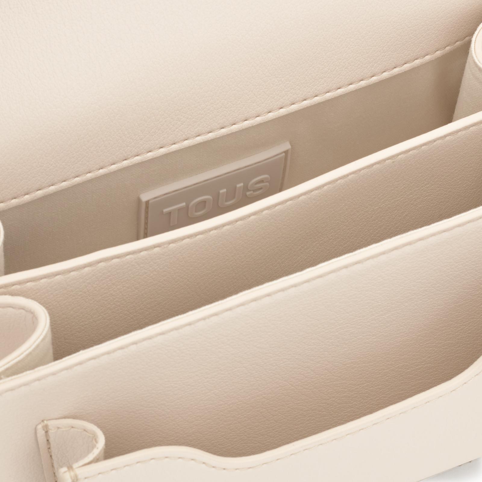 Bolso bandolera pequeño Audree Eyelets de poliuretano en color beige